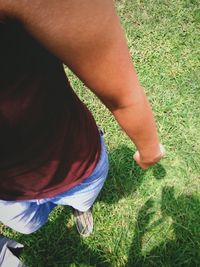 Man standing on grassy field