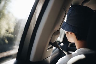 Close-up of man in car