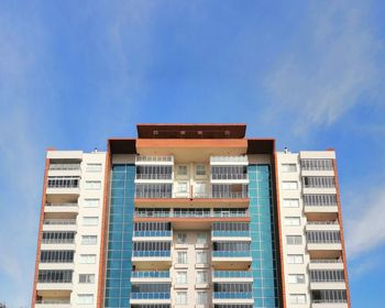 Low angle view of building against blue sky