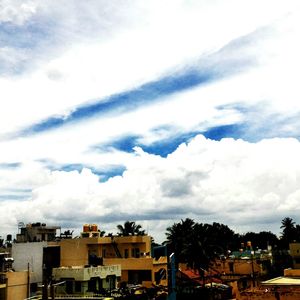 Building against cloudy sky