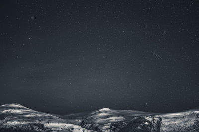 Scenic view of star field against sky at night