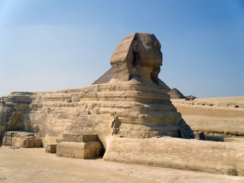 Statue of historical building against clear sky