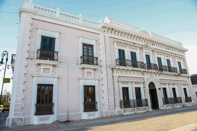 Low angle view of old building against sky