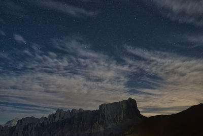 Scenic view of landscape against sky at night