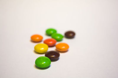 High angle view of multi colored balls on table