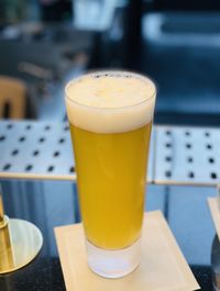 Close-up of beer in glass on table