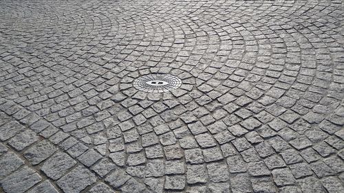 High angle view of manhole on street