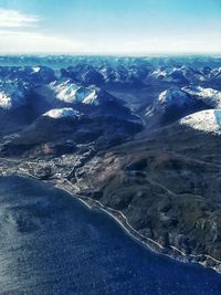 Aerial view of dramatic landscape against sky