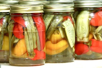 Close-up of multi colored candies in glass jar