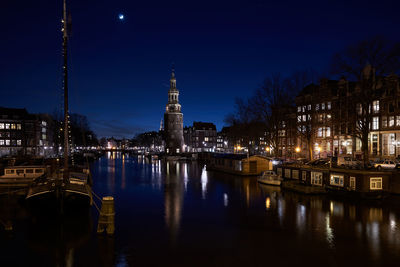 Reflection of illuminated buildings in water