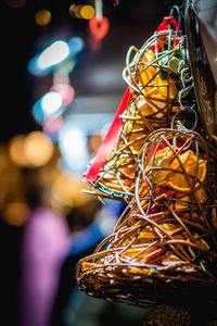 Close-up of illuminated decorations at night