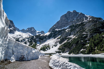 Scenic view of snowcapped mountains against sky