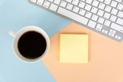 Directly above shot of coffee cup on table