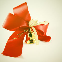 Close-up of christmas decorations over white background