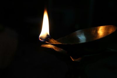 Close-up of fire over black background