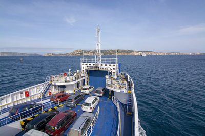 High angle view of ship by sea against sky