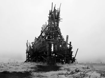 Old built structure on land during foggy weather