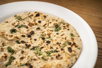 High angle view of bread in bowl on table