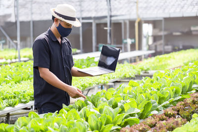 Man working on mobile phone