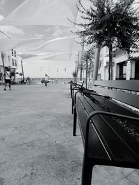 Empty chairs in park