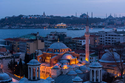 Panoramic view of illuminated city at night