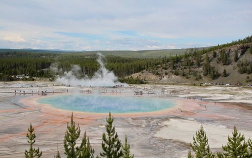 Scenic view of landscape against cloudy sky