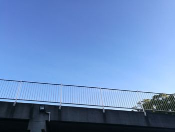 Low angle view of bridge against clear sky