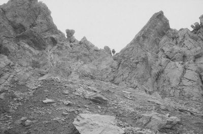 Rock formation on land against clear sky