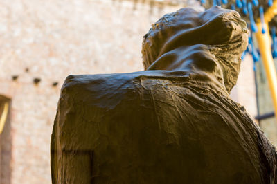 Close-up of statue against wall