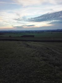 Scenic view of landscape against sky during sunset