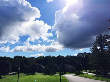 Scenic view of landscape against cloudy sky