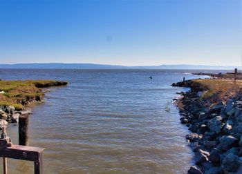 Scenic view of sea against clear sky