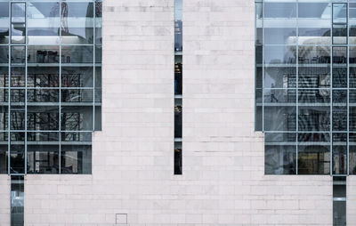 Reflection of building on window