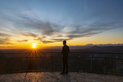 Rear view of man standing at observation point