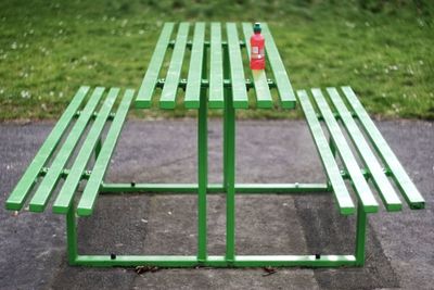 Empty bench in park