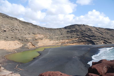 Scenic view of volcanic landscape against sky