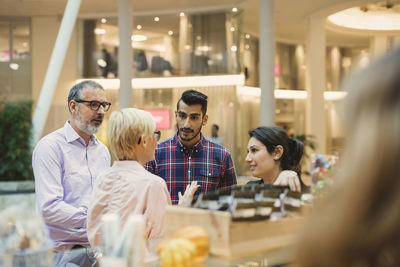 Multi-ethnic business people having discussion in office