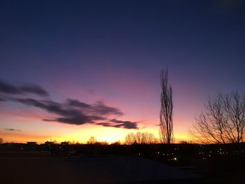 Scenic view of landscape at sunset