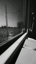 Railroad tracks seen through train window