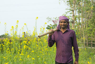 Full length of man standing on field