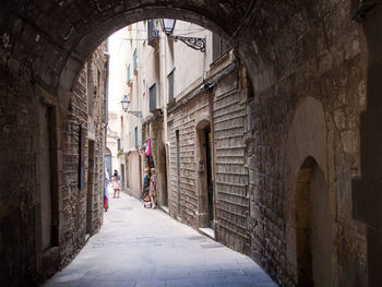 Narrow alley amidst old buildings