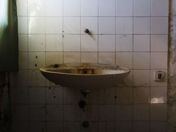 Broken glass of bathroom at home