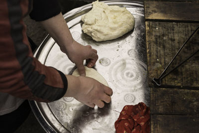 High angle view of man working on table