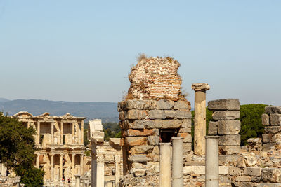 Old building of ephesus against clear sky