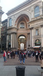 Tourists in front of historic building