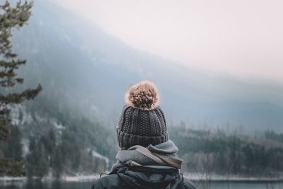 Rear view of woman looking at mountain