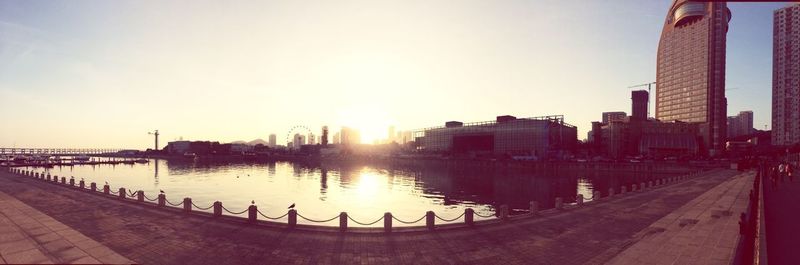 Panoramic view of cityscape against clear sky