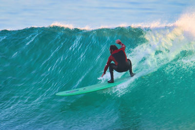 Man surfing in sea