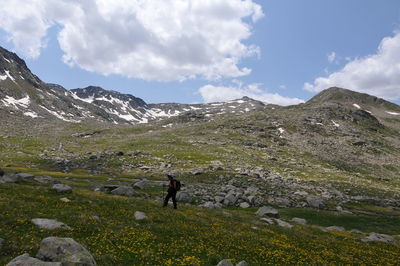 Full length of man on mountain against sky