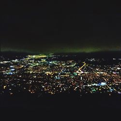 Aerial view of city at night